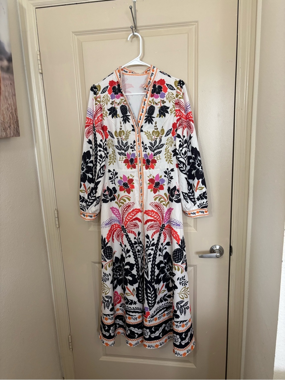 White Maxi Dress with Vibrant Floral Embroidery